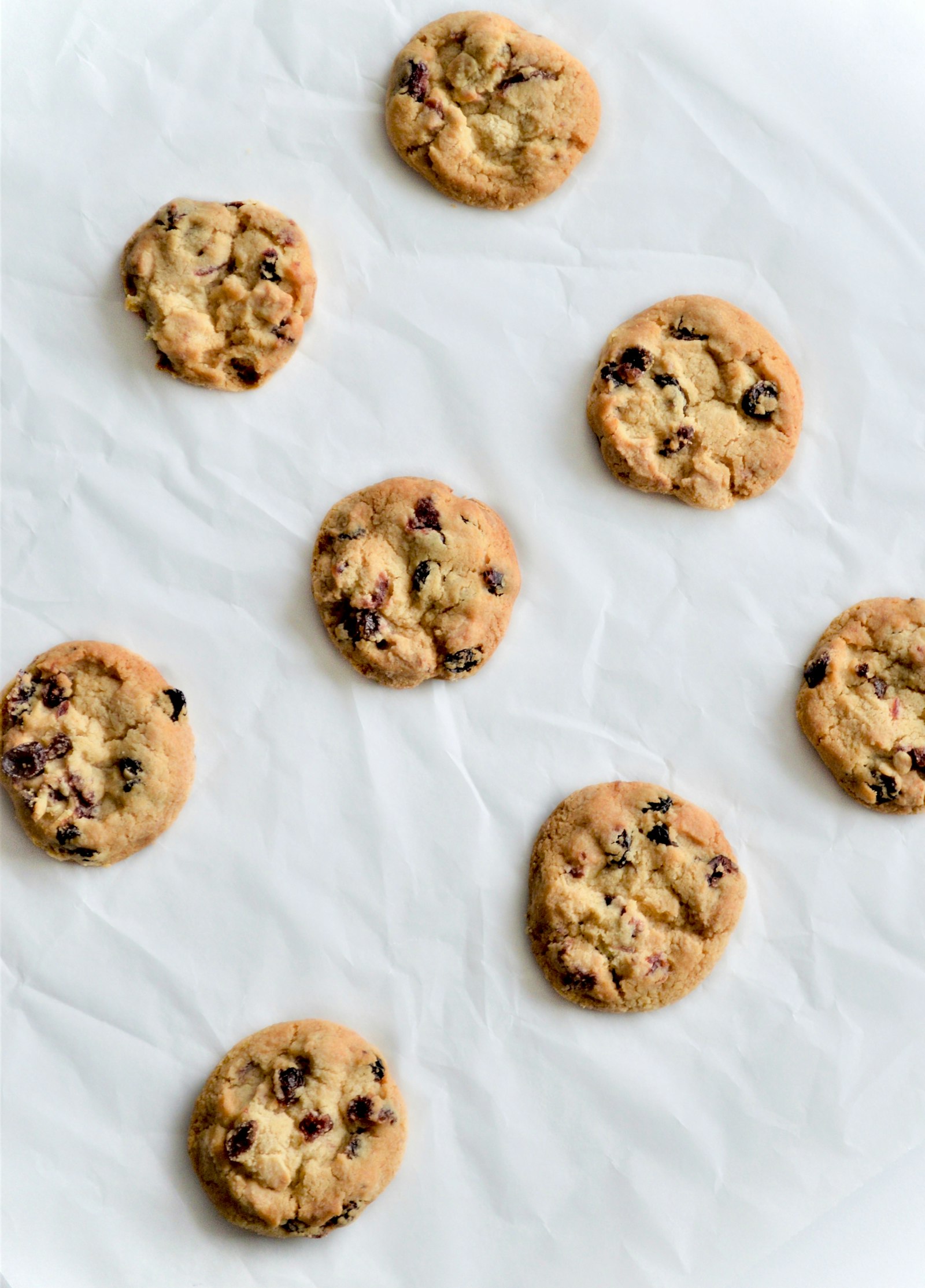 Cookies on white linen, from above